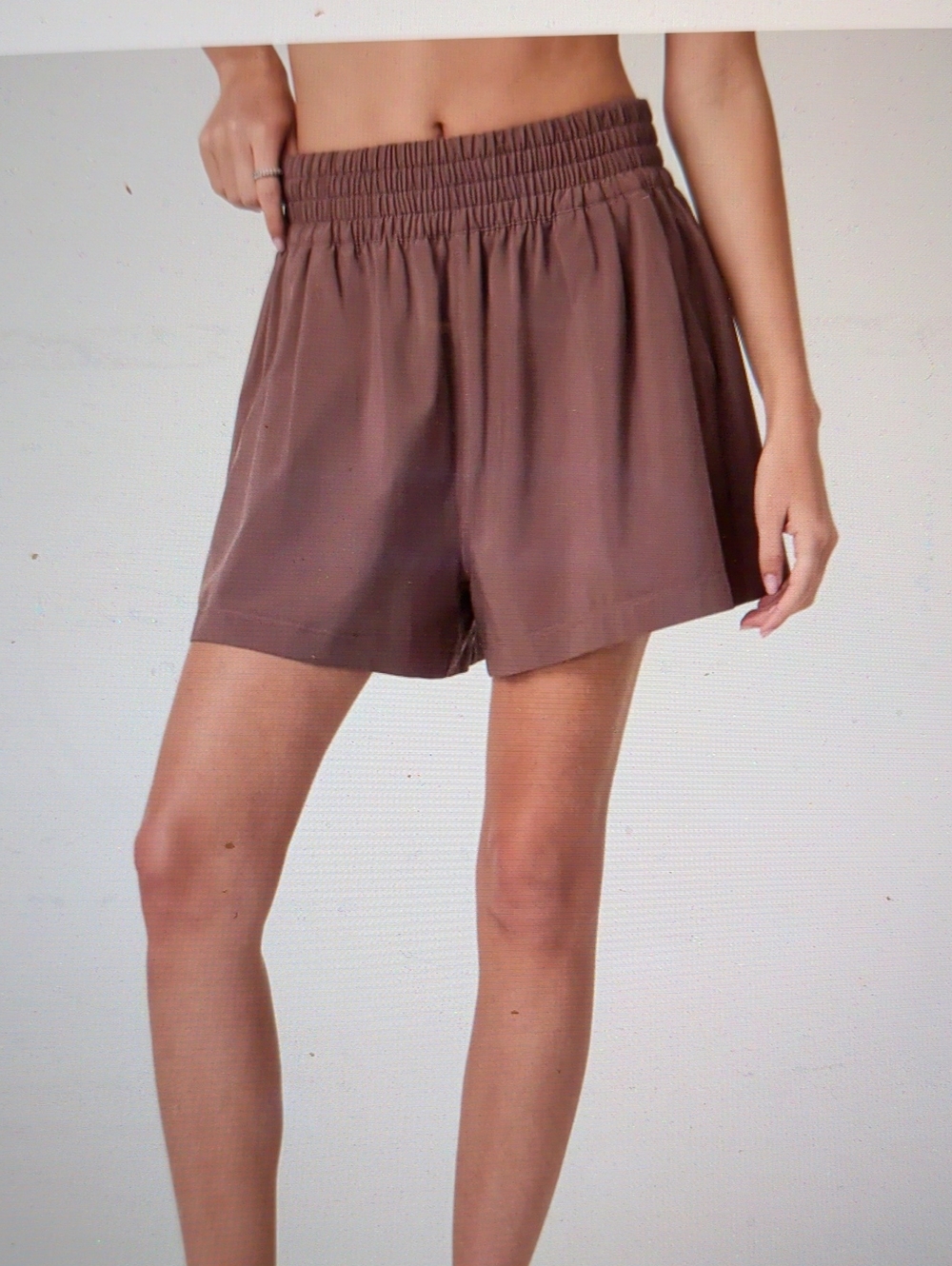 Vuori High Waist Shorts in Brown